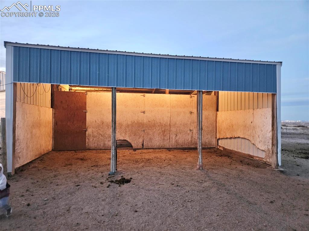 5633 Antelope Road Fountain, CO 80817 - Photo 13 of 19 an empty room with sliding glass door