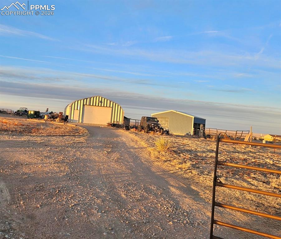 5633 Antelope Road Fountain, CO 80817 - Photo 17 of 19 a view of a big yard next to a road