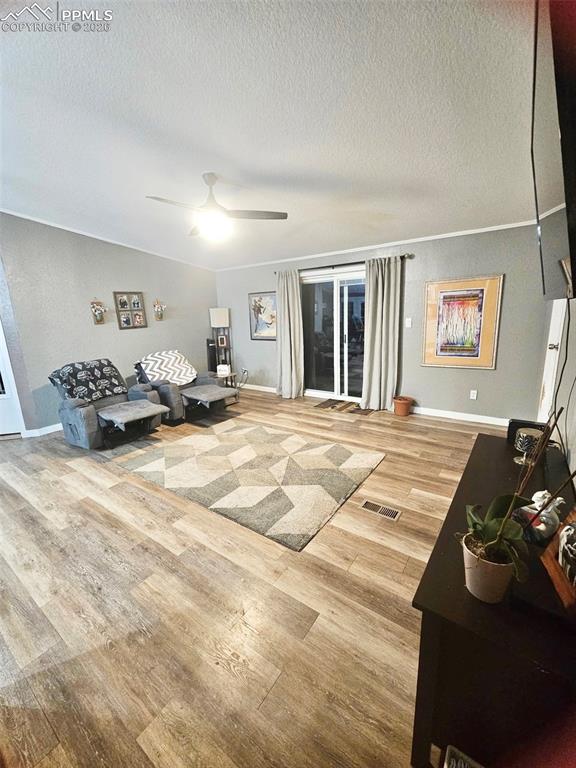 5633 Antelope Road Fountain, CO 80817 - Photo 5 of 19 a bedroom with a bed and a couch