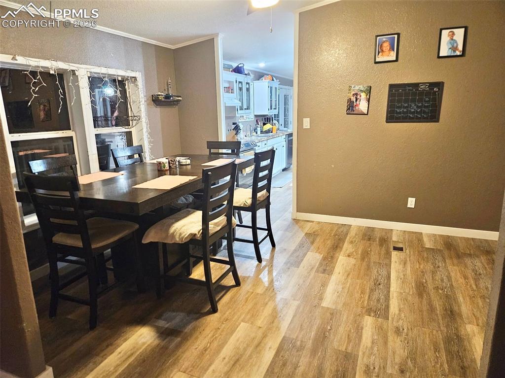 5633 Antelope Road Fountain, CO 80817 - Photo 9 of 19 a workspace with wooden floor