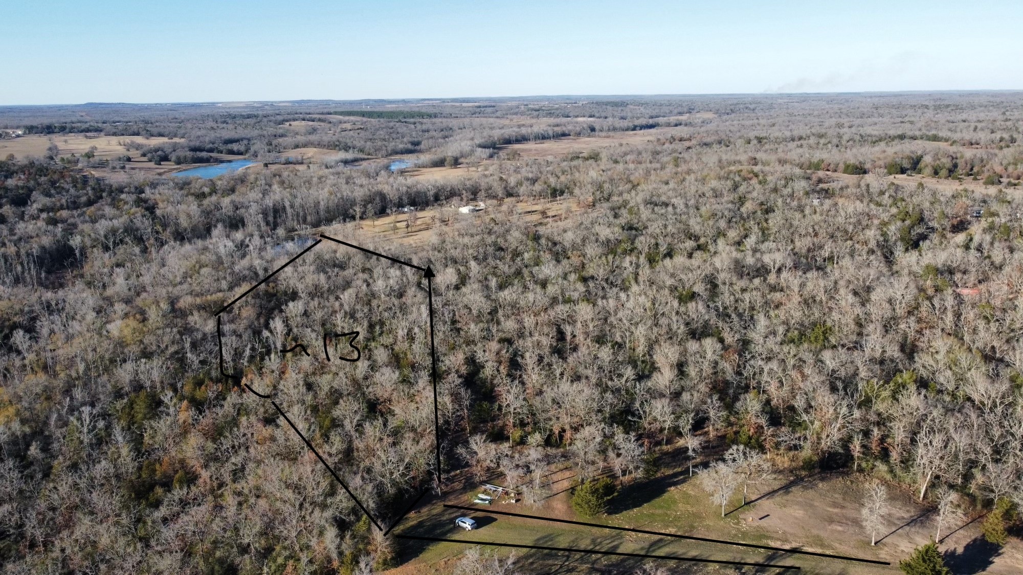 13 Ac Prairie Oakwood, TX 75855 - Photo 2 of 9 an aerial view of house with yard and mountain view in back