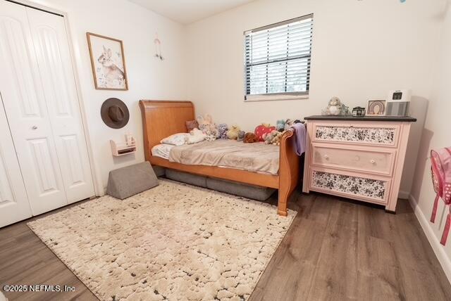 1701 Jones Road Jacksonville, FL 32220 - Photo 19 of 41 a bedroom with a bed and a window