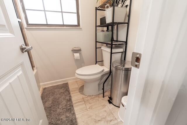 1701 Jones Road Jacksonville, FL 32220 - Photo 23 of 41 a bathroom with a toilet and a shower