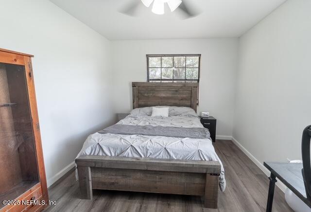 1701 Jones Road Jacksonville, FL 32220 - Photo 24 of 41 a bed sitting in a bedroom next to a window