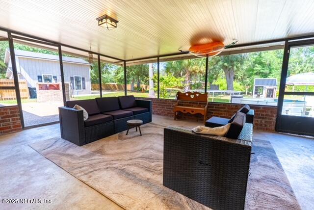 1701 Jones Road Jacksonville, FL 32220 - Photo 31 of 41 a living room with furniture and large windows