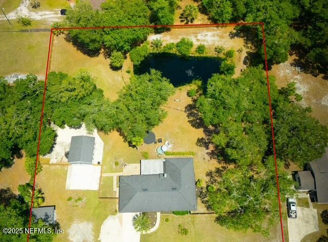 1701 Jones Road Jacksonville, FL 32220 - Photo 32 of 41 an aerial view of a house with a yard and lake view