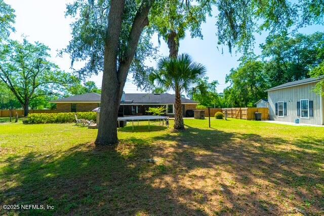 1701 Jones Road Jacksonville, FL 32220 - Photo 34 of 41 a view of a house with a yard