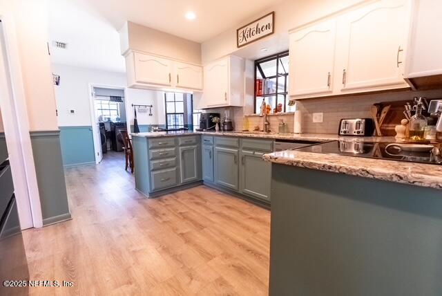1701 Jones Road Jacksonville, FL 32220 - Photo 10 of 41 a kitchen with stainless steel appliances granite countertop a sink dishwasher stove and cabinets