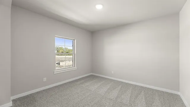 a bathroom with a toilet a sink a mirror a bathtub and vanity