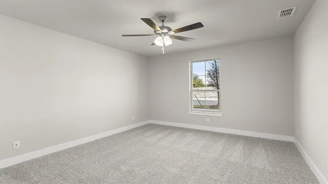 a view of kitchen with cabinets and wooden floor