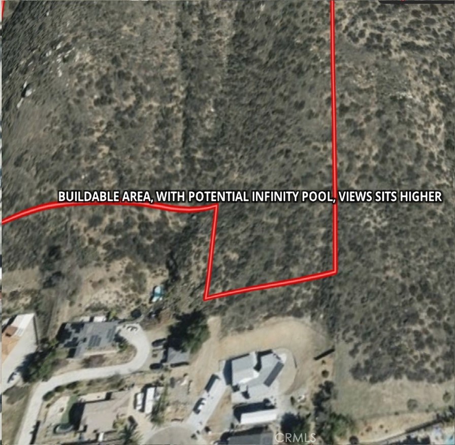 0 Rodeo Lakeside, CA 92040 - Photo 5 of 7 a street sign on a wall next to a road