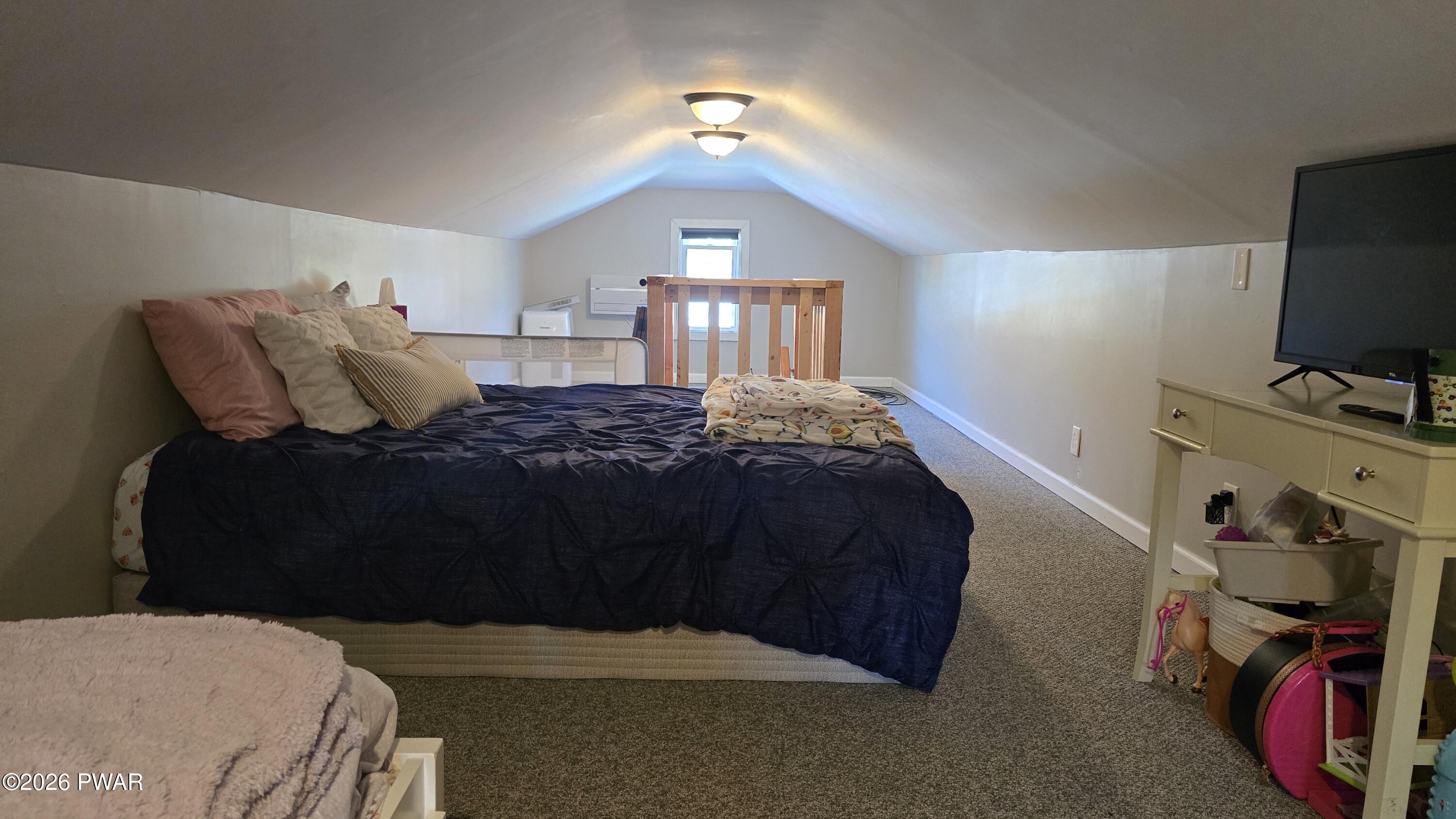 430 Griffith Road Tyler Hill, PA 18469 - Photo 18 of 31 a bedroom with a bed and a tv