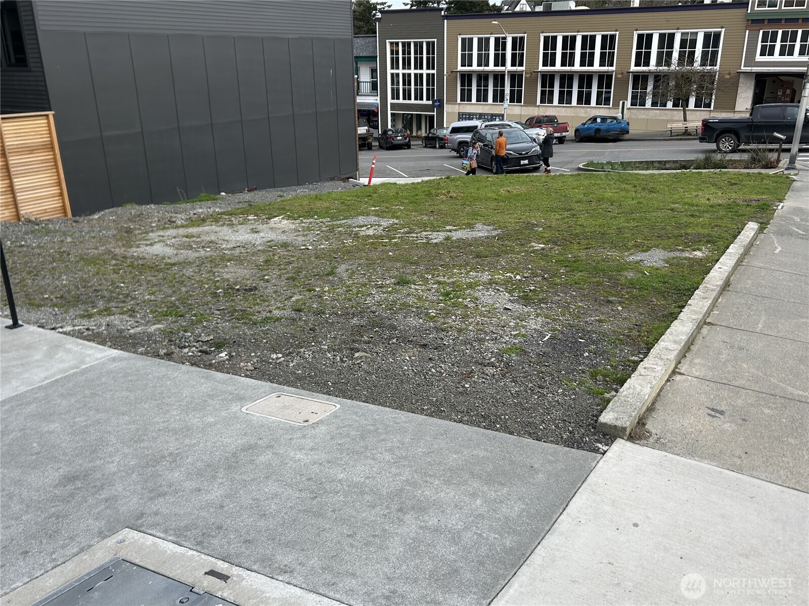 80 First Street South Friday Harbor, WA 98250 - Photo 5 of 8 a view of a house with backyard and sitting area