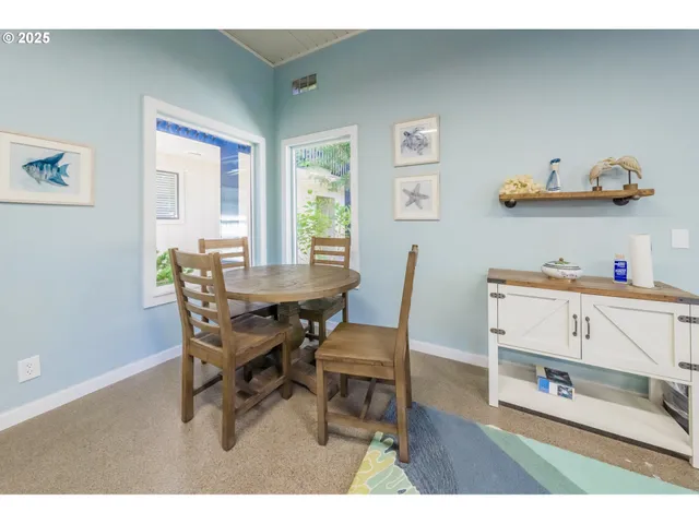 a view of swimming pool with outdoor seating