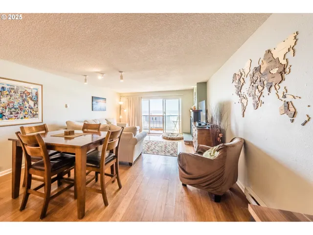 a kitchen with a refrigerator a stove and a cabinets
