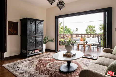 a close view of dining table with chairs