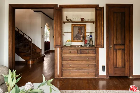 a view of front door with wooden floor