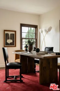 a bathroom with a sink toilet and a mirror