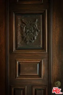 a bedroom with a bed and a night stand