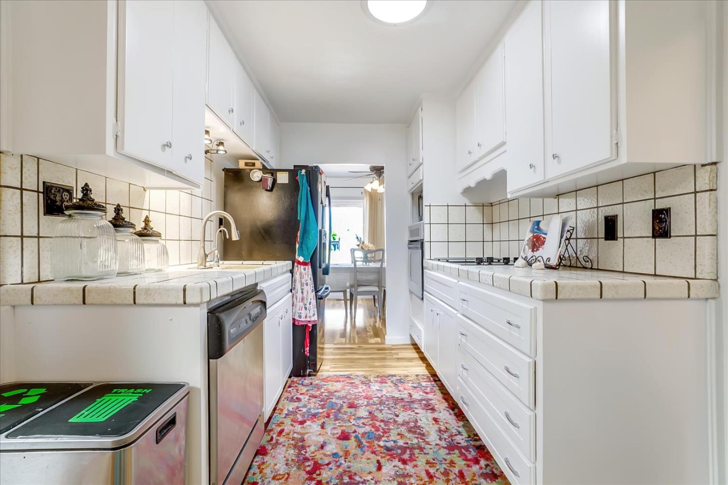3320 Golf Drive San Jose, CA 95127 - Photo 6 of 14 a kitchen with stainless steel appliances granite countertop a refrigerator and a stove