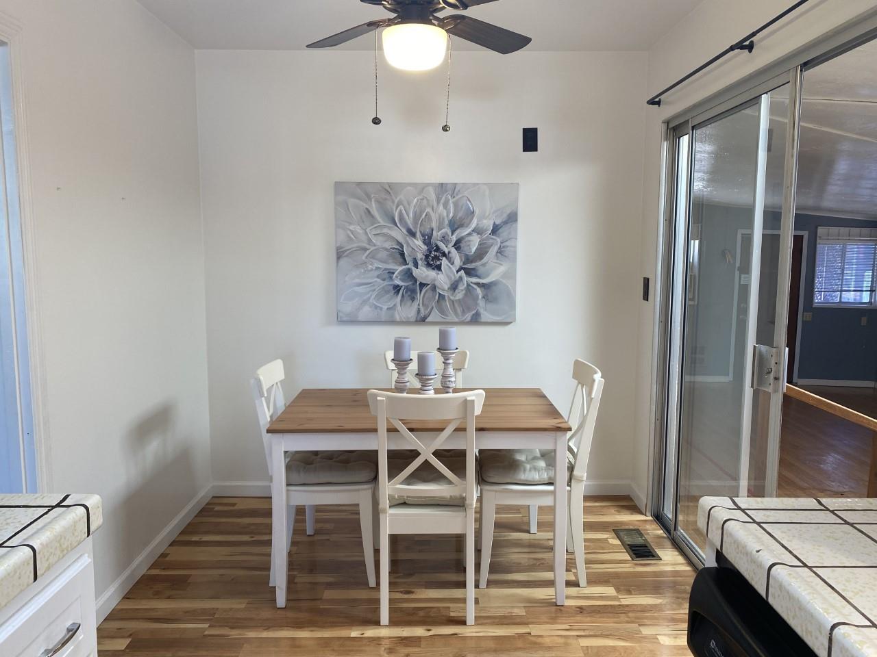 3320 Golf Drive San Jose, CA 95127 - Photo 7 of 14 a view of a dining room with furniture and wooden floor