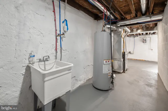 a bathroom with a sink a mirror and shower