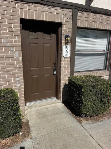 a front view of a house with a garage