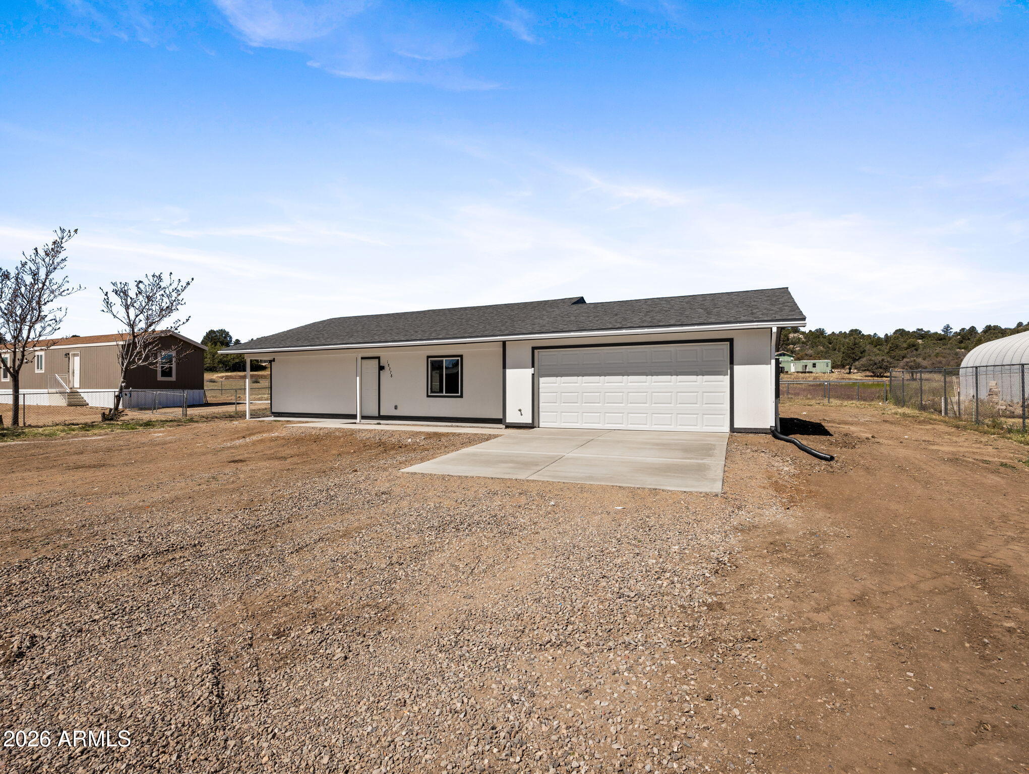 18278 Frontier Road Peeples Valley, AZ 86332 - Photo 8 of 31 a house view with a outdoor space