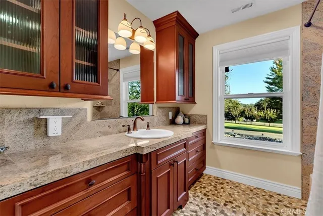 an aerial view of a house a yard and a garden