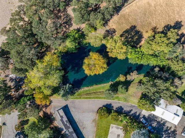 a view of a swimming pool with an outdoor space and seating area