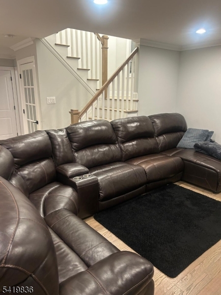 15-17 Rector Avenue Woodbridge, NJ 07095 - Photo 14 of 33 a living room with furniture and stairs