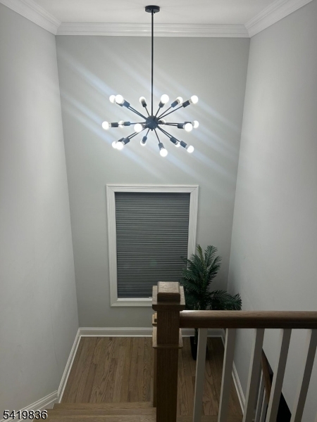 15-17 Rector Avenue Woodbridge, NJ 07095 - Photo 20 of 33 a view of a hallway with a chandelier fan