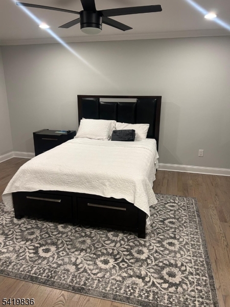 15-17 Rector Avenue Woodbridge, NJ 07095 - Photo 24 of 33 a large bed in a small room
