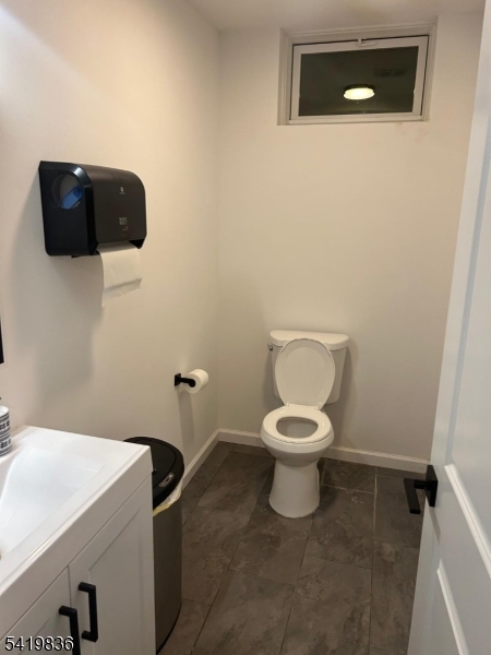 15-17 Rector Avenue Woodbridge, NJ 07095 - Photo 29 of 33 a bathroom with a toilet