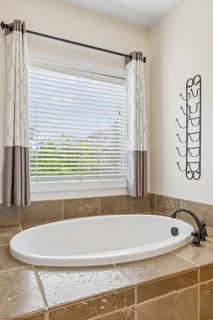 a bathroom with a bathtub