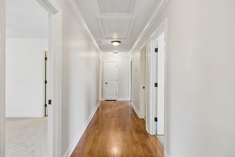 a view of a house with backyard and garden