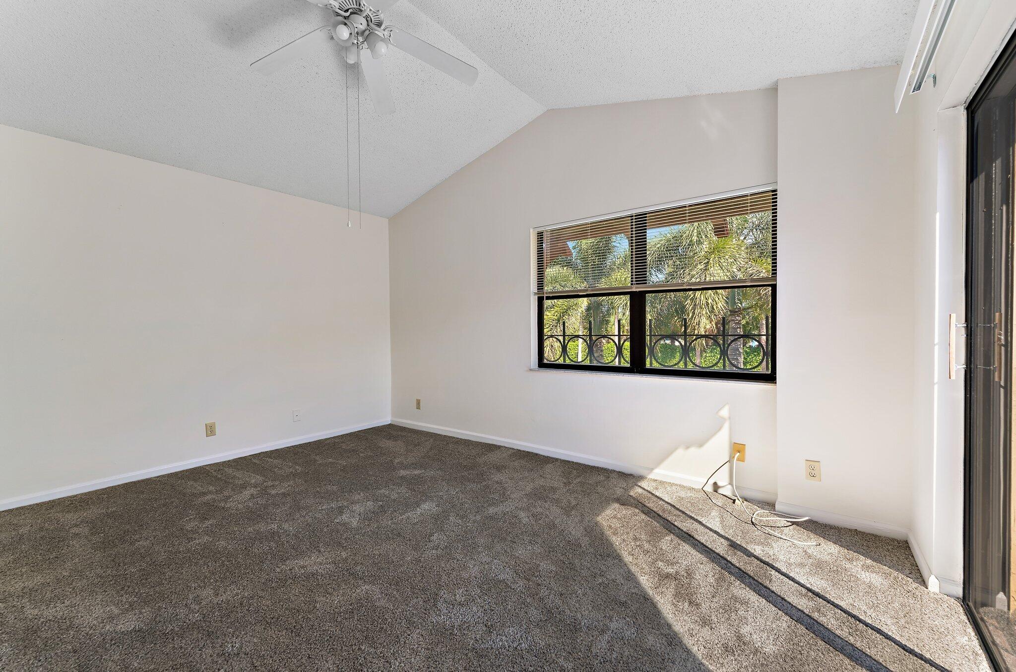 3 Uno Lago Drive, Unit 3 Juno Beach, FL 33408 - Photo 20 of 31 a room with a window