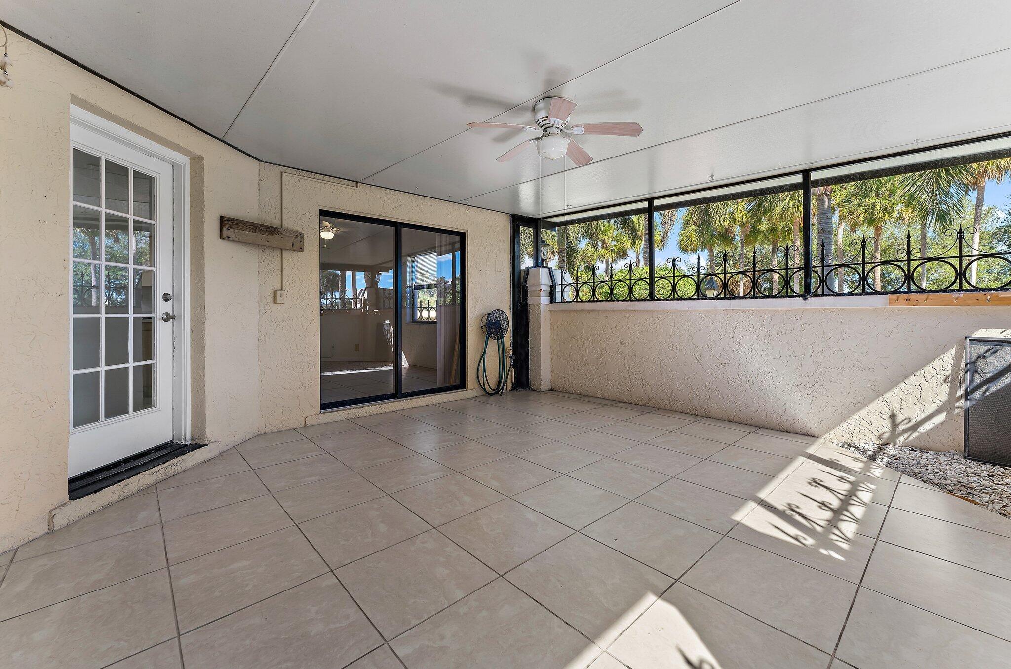 3 Uno Lago Drive, Unit 3 Juno Beach, FL 33408 - Photo 6 of 31 a view of an empty room with a window