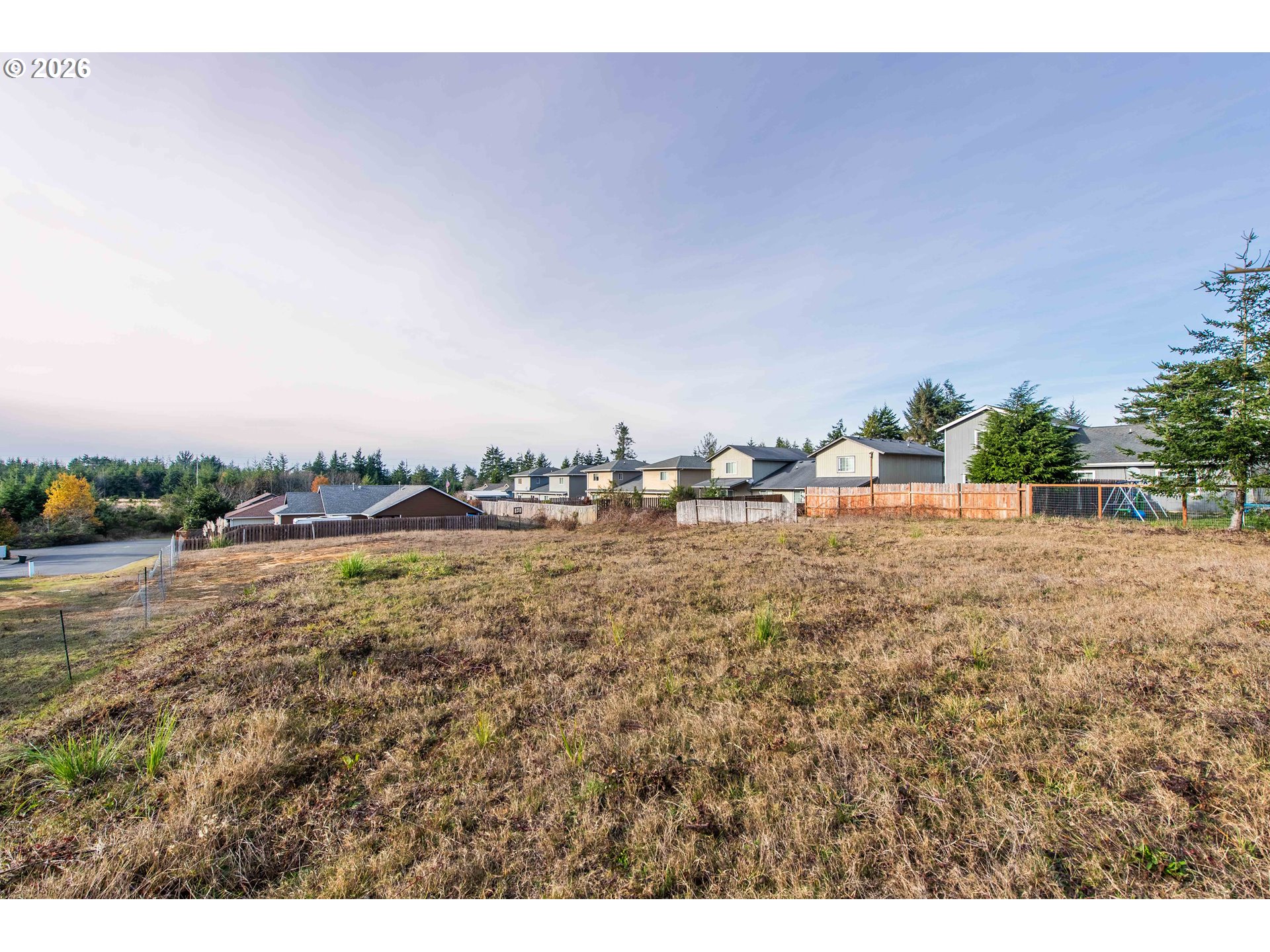 0 Fulton Avenue, Unit 312 Coos Bay, OR 97420 - Photo 9 of 29 a view of a yard with an outdoor space
