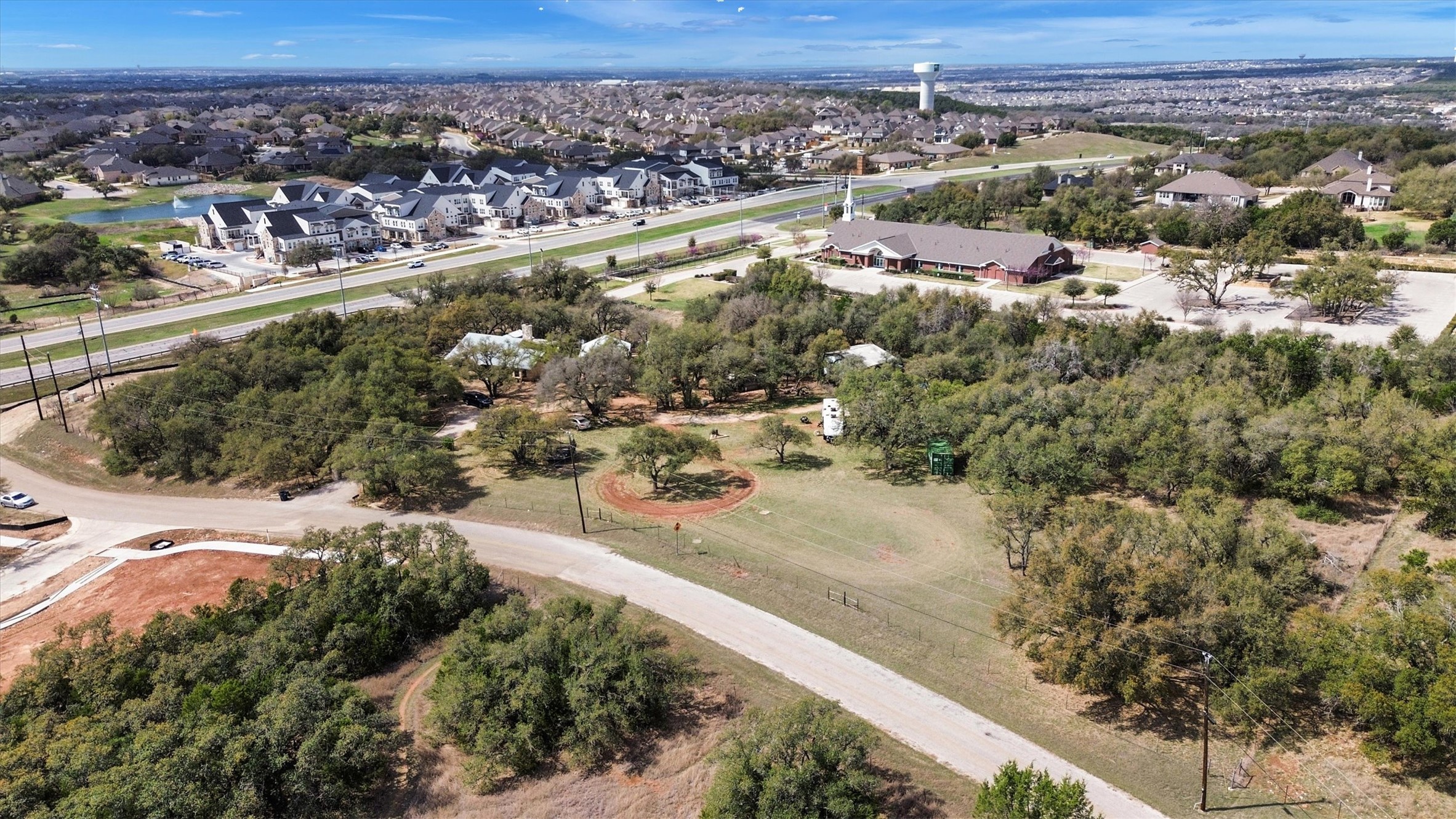 51 County Road 264 Leander, TX 78641 - Photo 2 of 15 an aerial view of residential houses with outdoor space