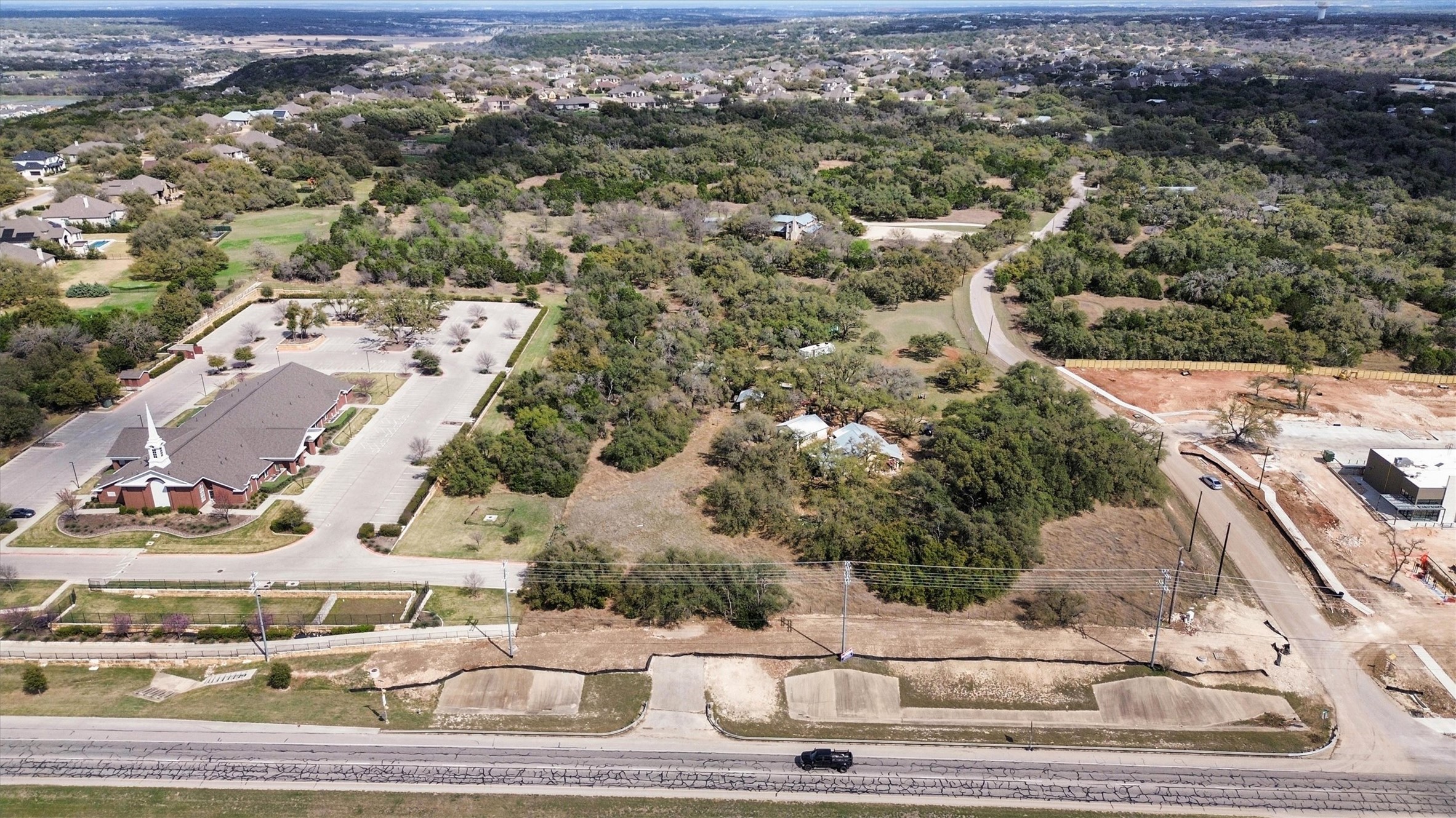 51 County Road 264 Leander, TX 78641 - Photo 3 of 15 an aerial view of residential houses with outdoor space