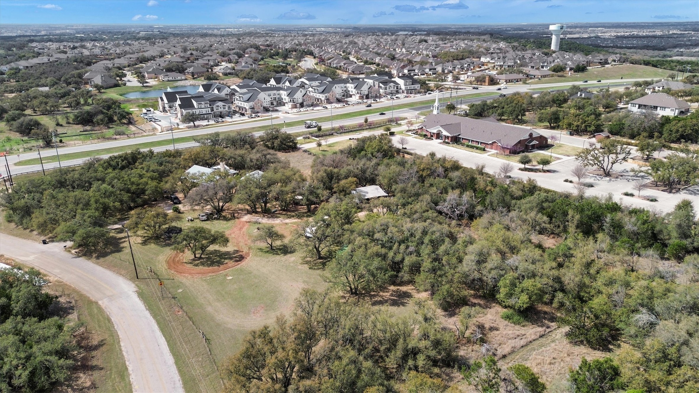 51 County Road 264 Leander, TX 78641 - Photo 6 of 15 an aerial view of a houses with a yard