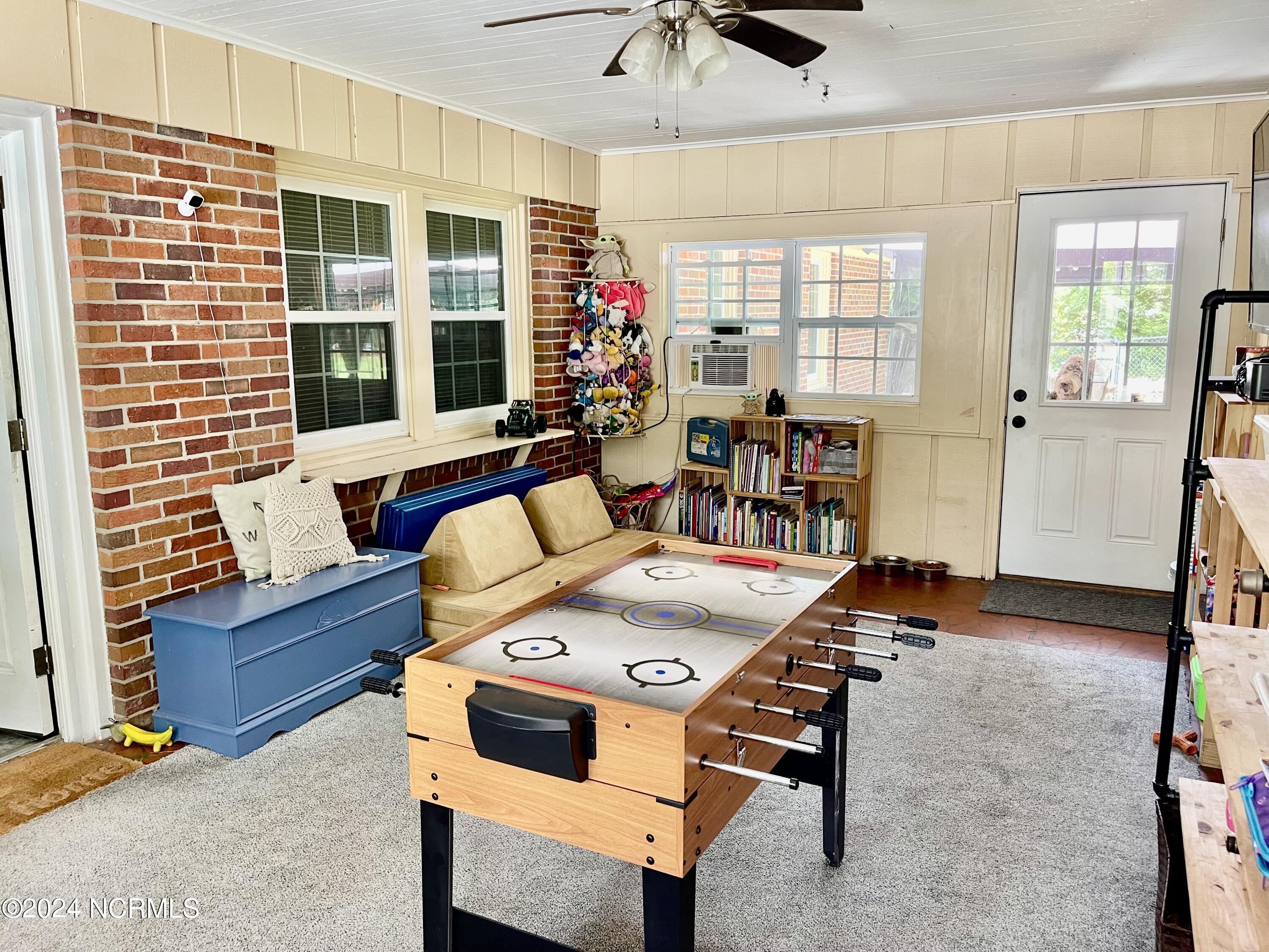 129 Woodland Road Rockingham, NC 28379 - Photo 16 of 38 sunroom/playroom