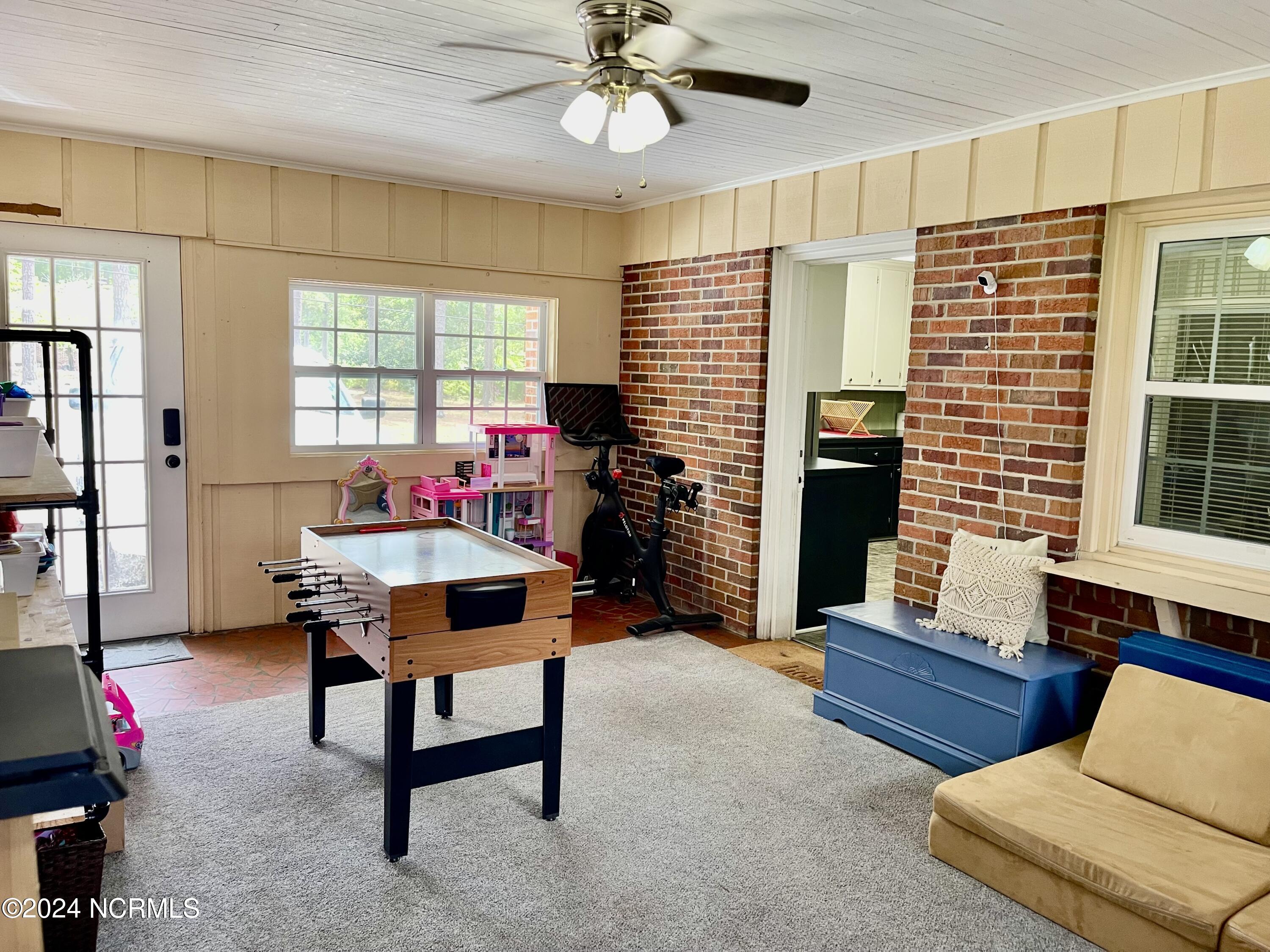 129 Woodland Road Rockingham, NC 28379 - Photo 17 of 38 playroom/sunroom