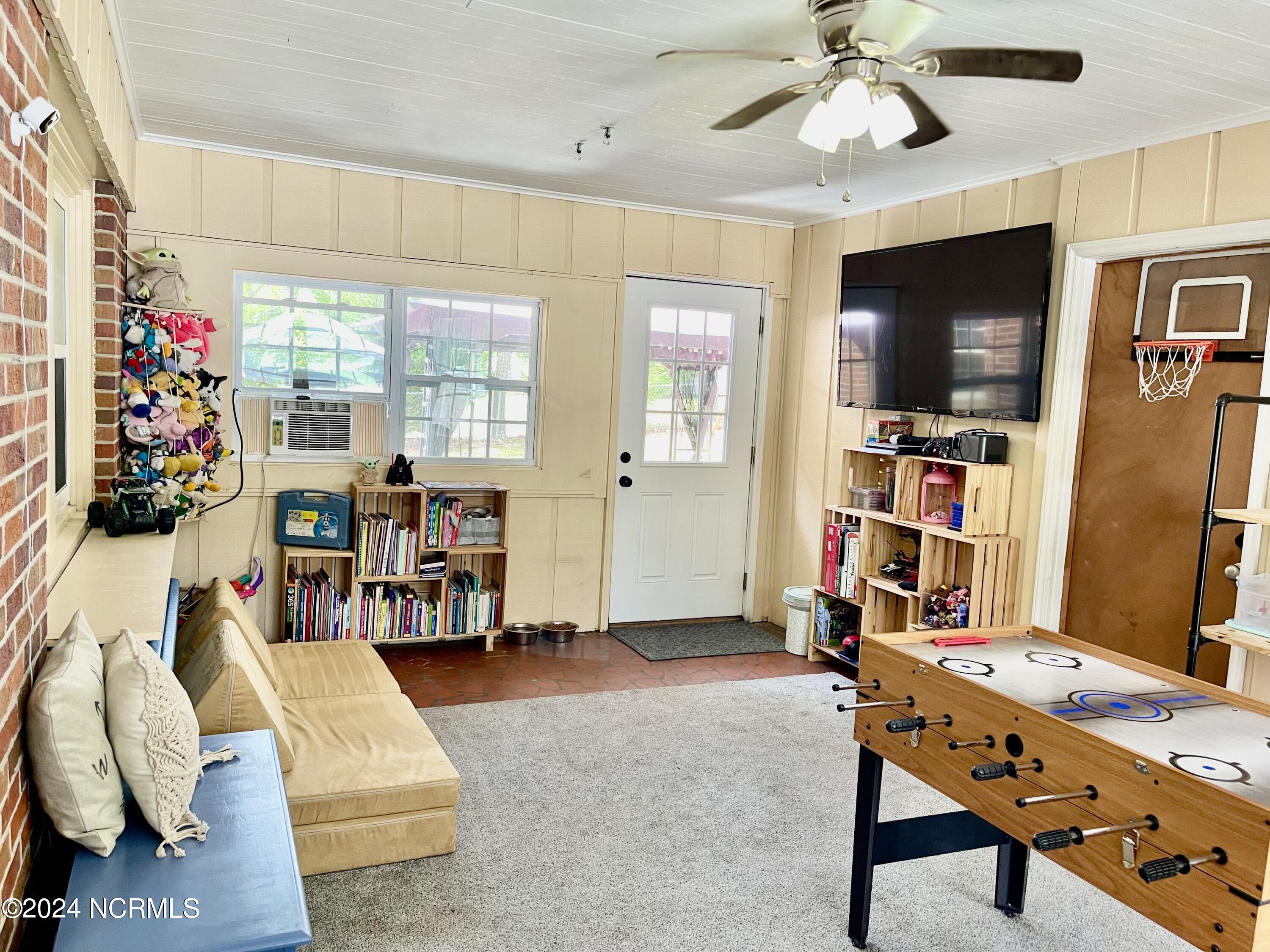 129 Woodland Road Rockingham, NC 28379 - Photo 30 of 38 playroom/sunroom