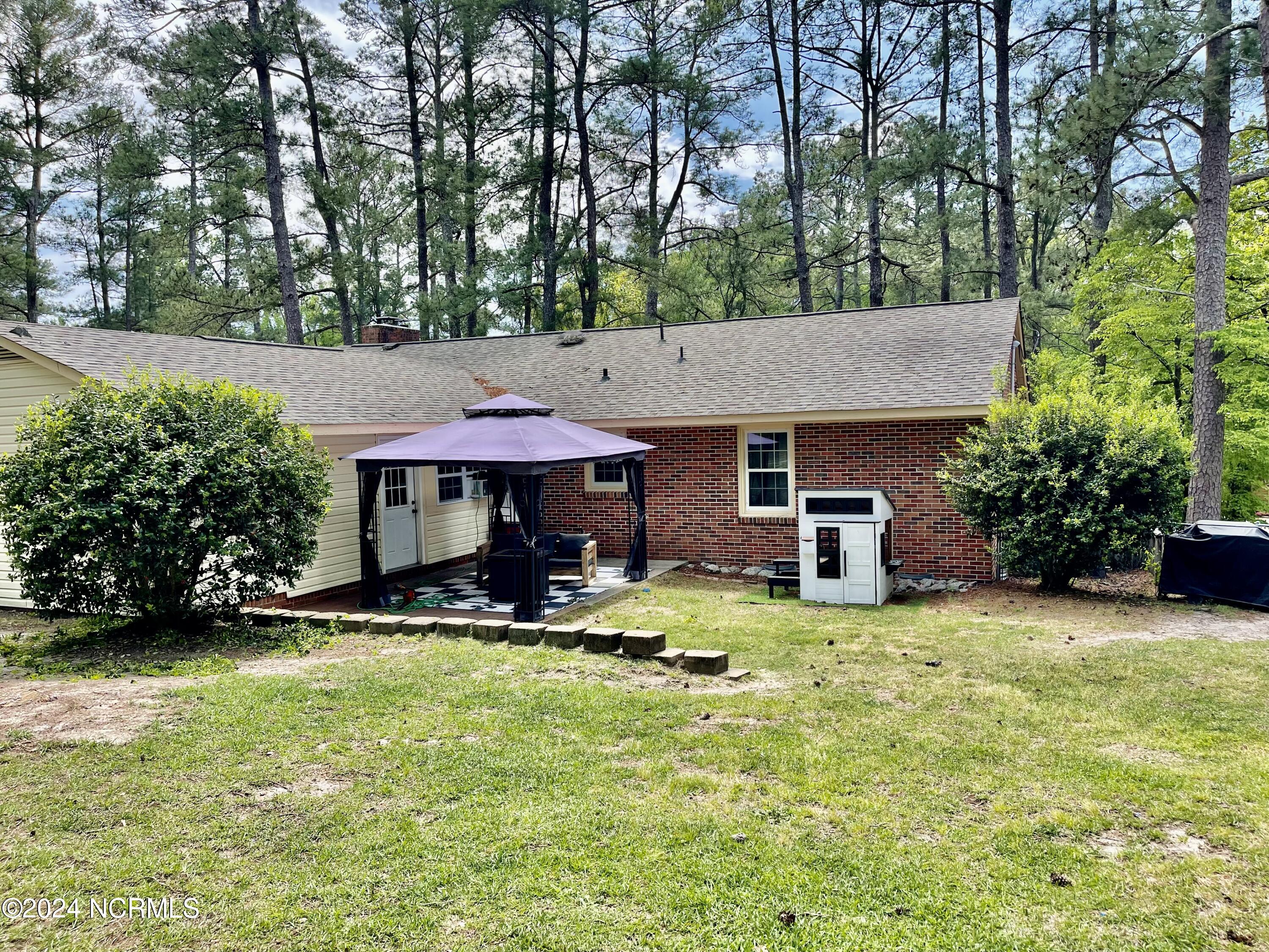 129 Woodland Road Rockingham, NC 28379 - Photo 31 of 38 back patio