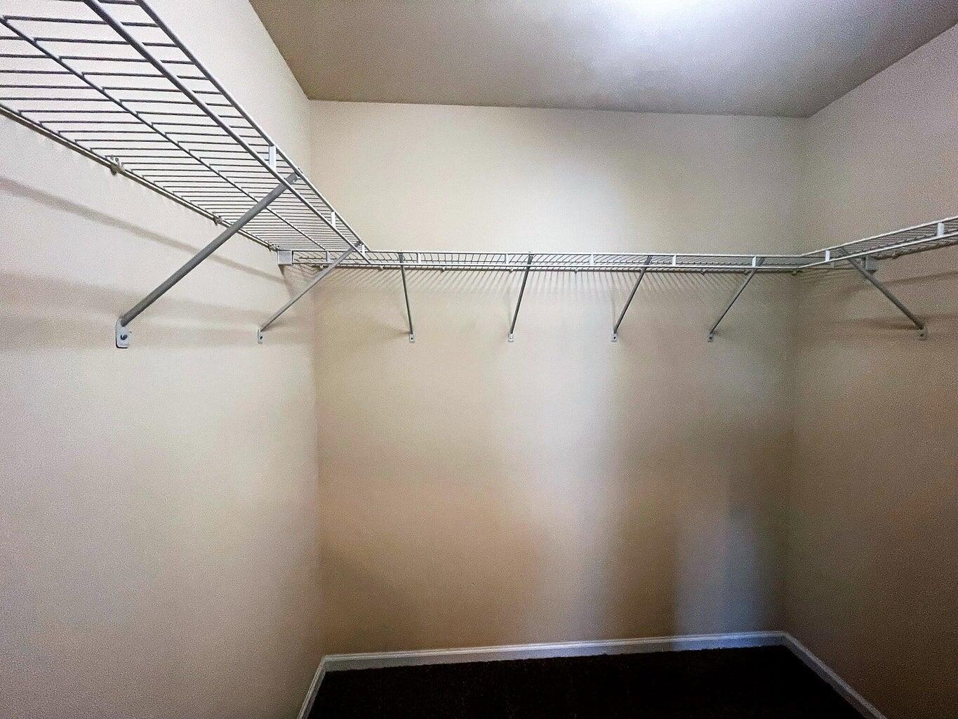 1151 East Townline Road, Unit 205 Lake Geneva, WI 53147 - Photo 4 of 18 Primary Bedroom Walk-in Closet