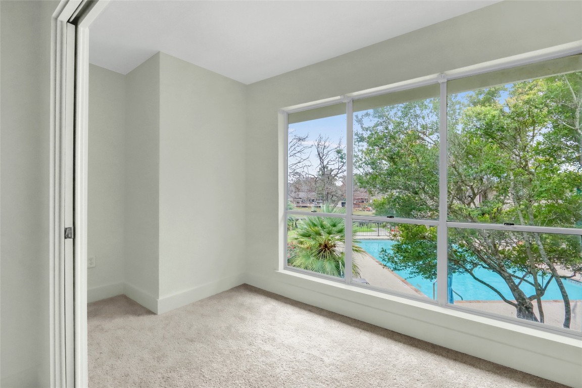 551 Terminal Loop Road, Unit B3 McQueeney, TX 78123 - Photo 14 of 23 a view of a room that has a large window