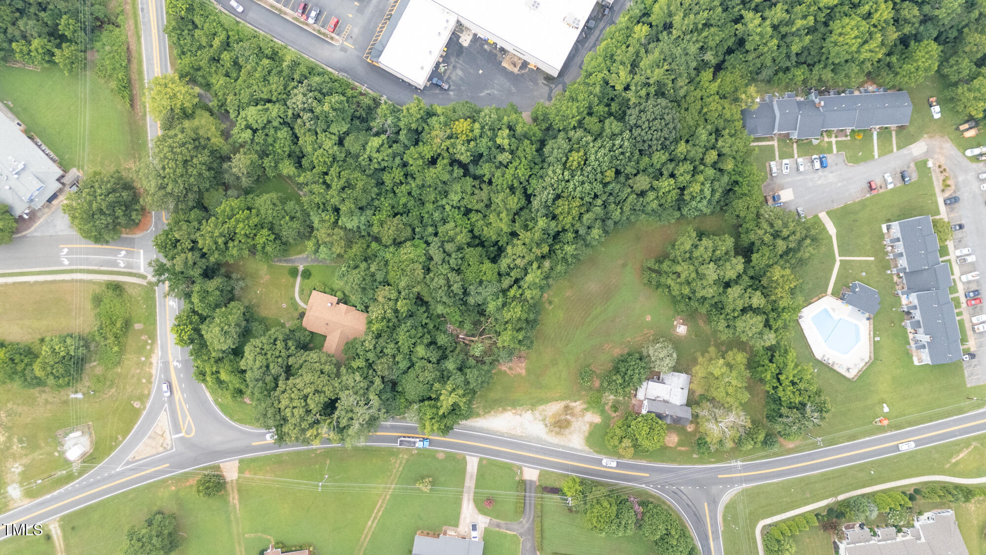 1704 Orange Grove Road Hillsborough, NC 27278 - Photo 6 of 11 swimming pool view with a garden space