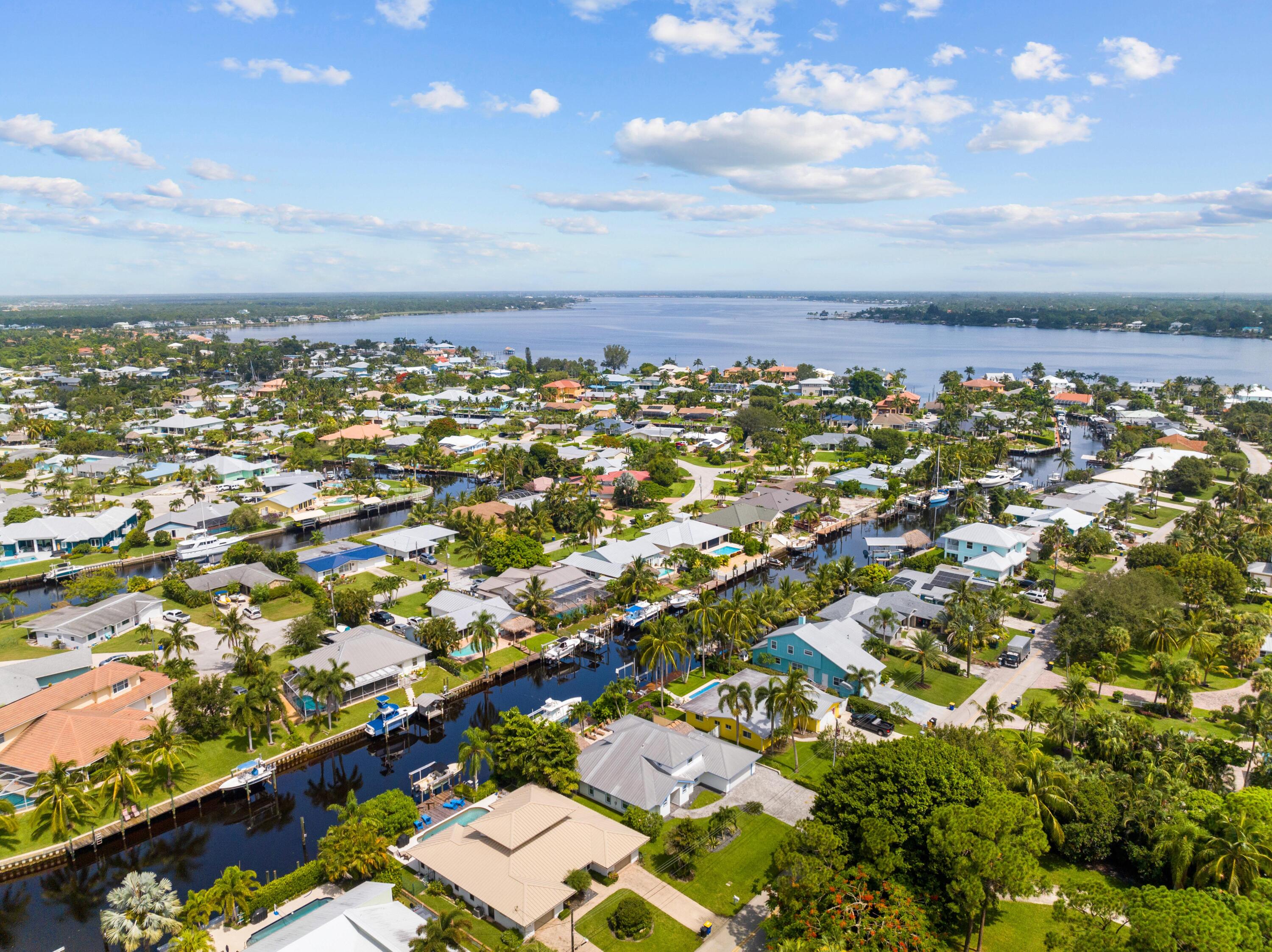1459 Southwest Seahawk Way Palm City, FL 34990 - Photo 38 of 43 an aerial view of residential building with parking space